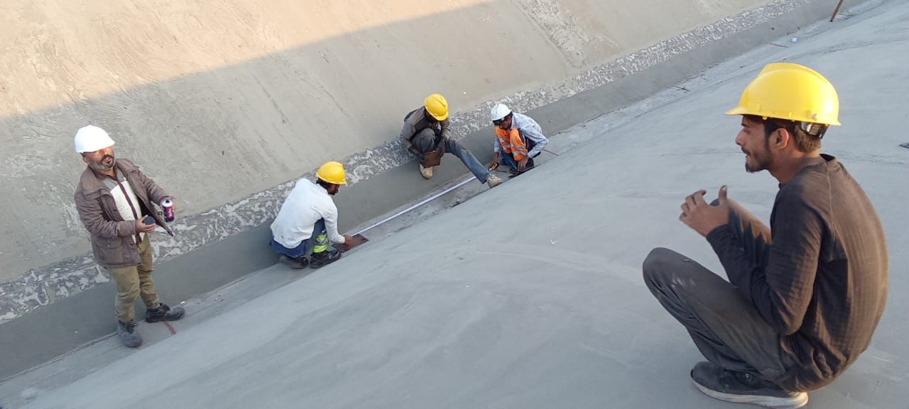 FieldMan engineers surveying and setting out a roof structure