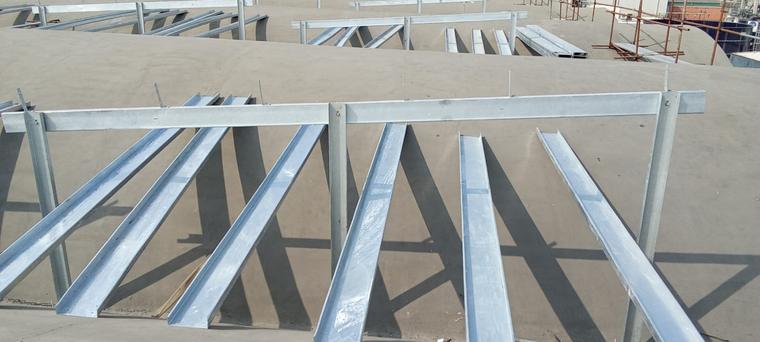 Purlin & Rafter Detail — Galvanised rafters fixed to engineered shell-roof anchor points